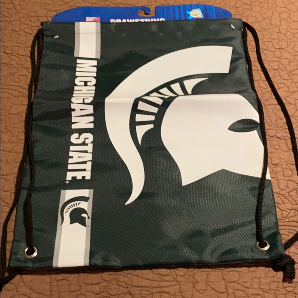 Drawstring back pack.